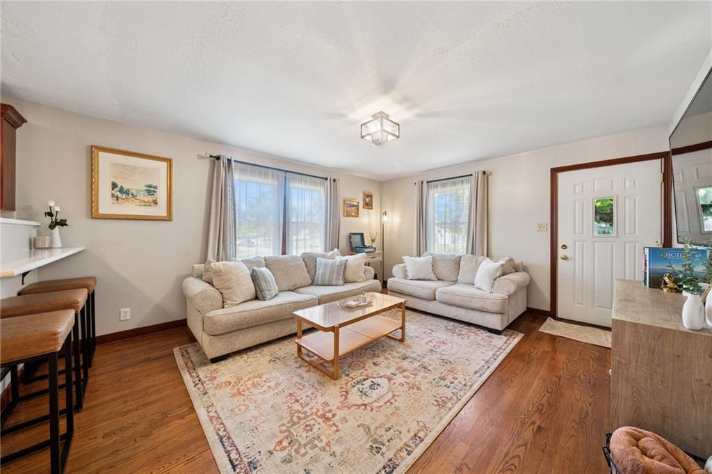 135 Pear Orchard Road Coraopolis, PA 15108 - Photo 10 of 43 a living room with furniture or couch and a wooden floor