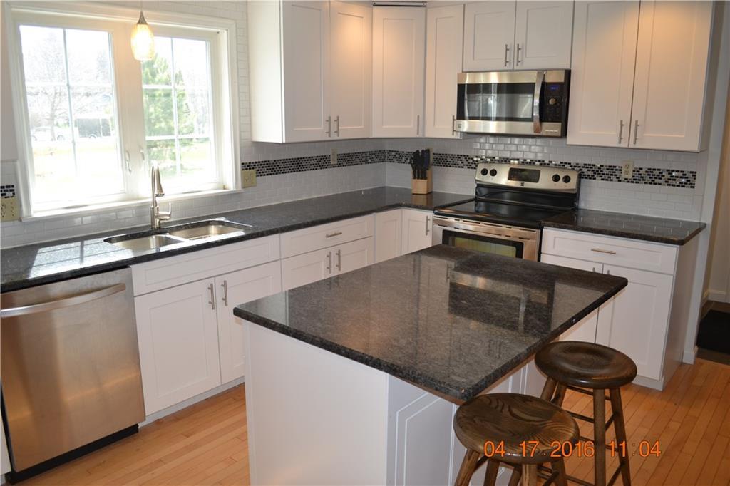 163 Curtis Road Portland, ME 04103 - Photo 9 of 12 New kitchen with stainless steel...