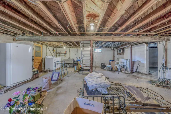 a view of a room with furniture