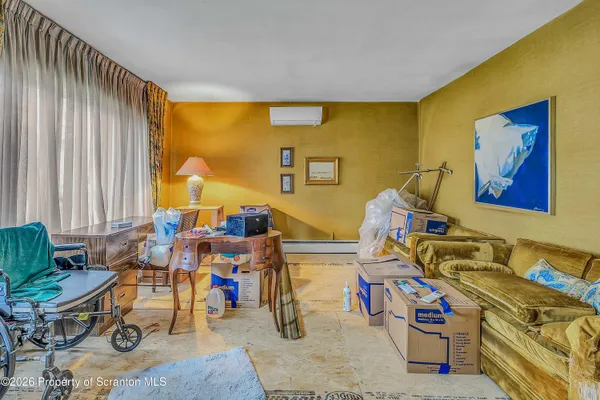 a view of a livingroom with lounge chair