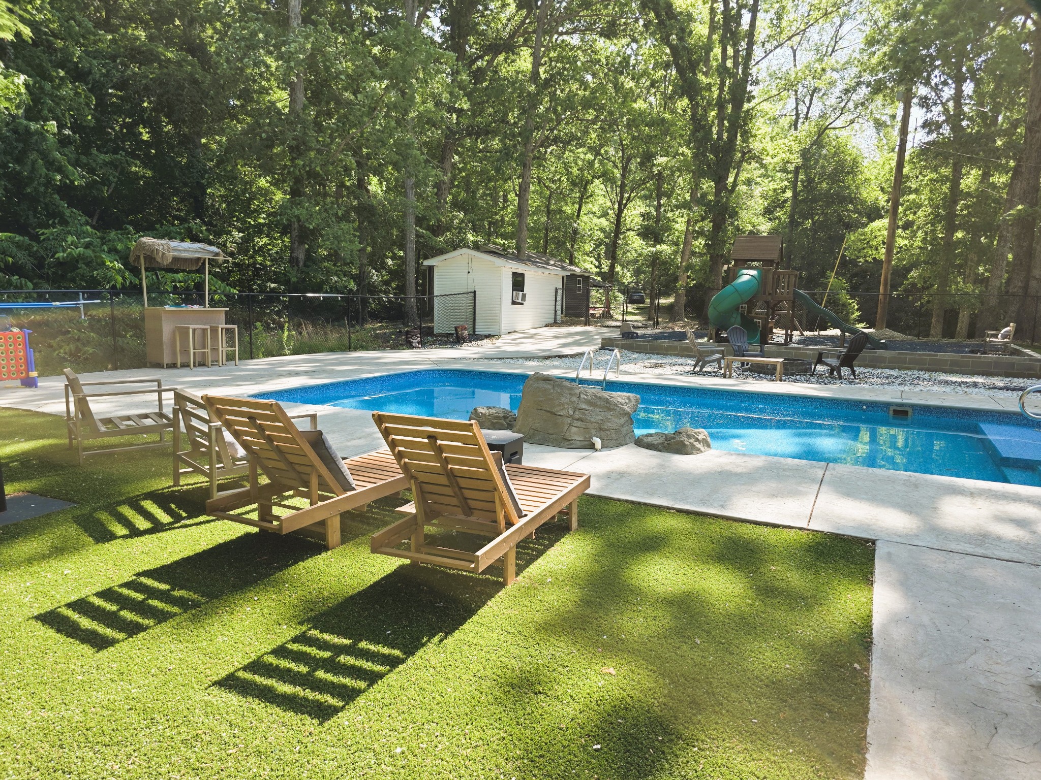 1975 Kelly Road Holladay, TN 38341 - Photo 2 of 95 a view of a swimming pool with a yard
