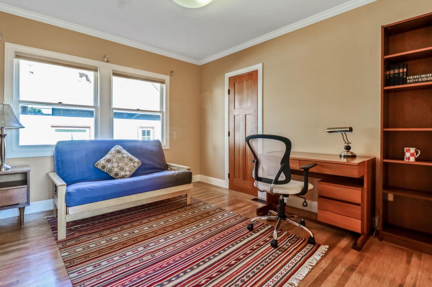 1401 Channing Way Berkeley, CA 94702 - Photo 12 of 43 a view of a workspace with furniture and a window