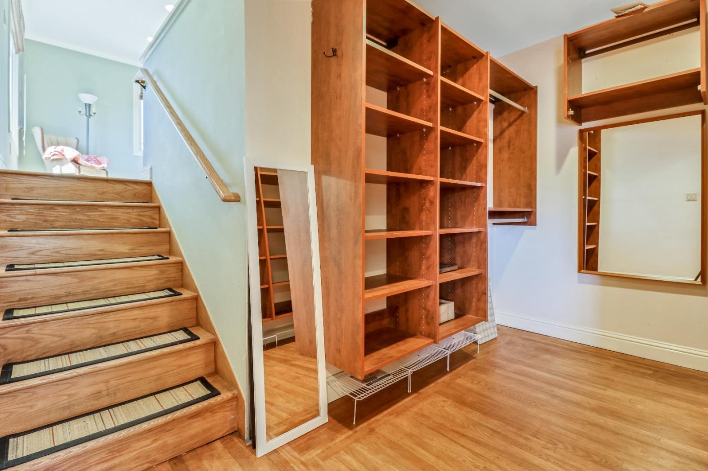 1401 Channing Way Berkeley, CA 94702 - Photo 18 of 43 a view of staircase with white walls and a window