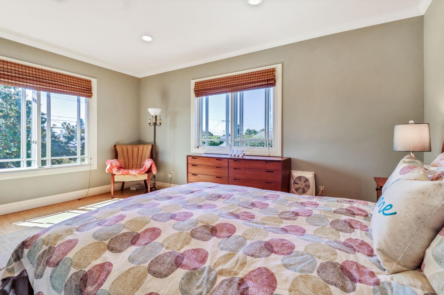 1401 Channing Way Berkeley, CA 94702 - Photo 20 of 43 a bedroom with a large bed and a window