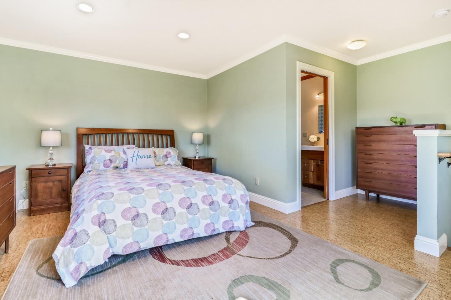 1401 Channing Way Berkeley, CA 94702 - Photo 21 of 43 a bedroom with a bed and wooden floor