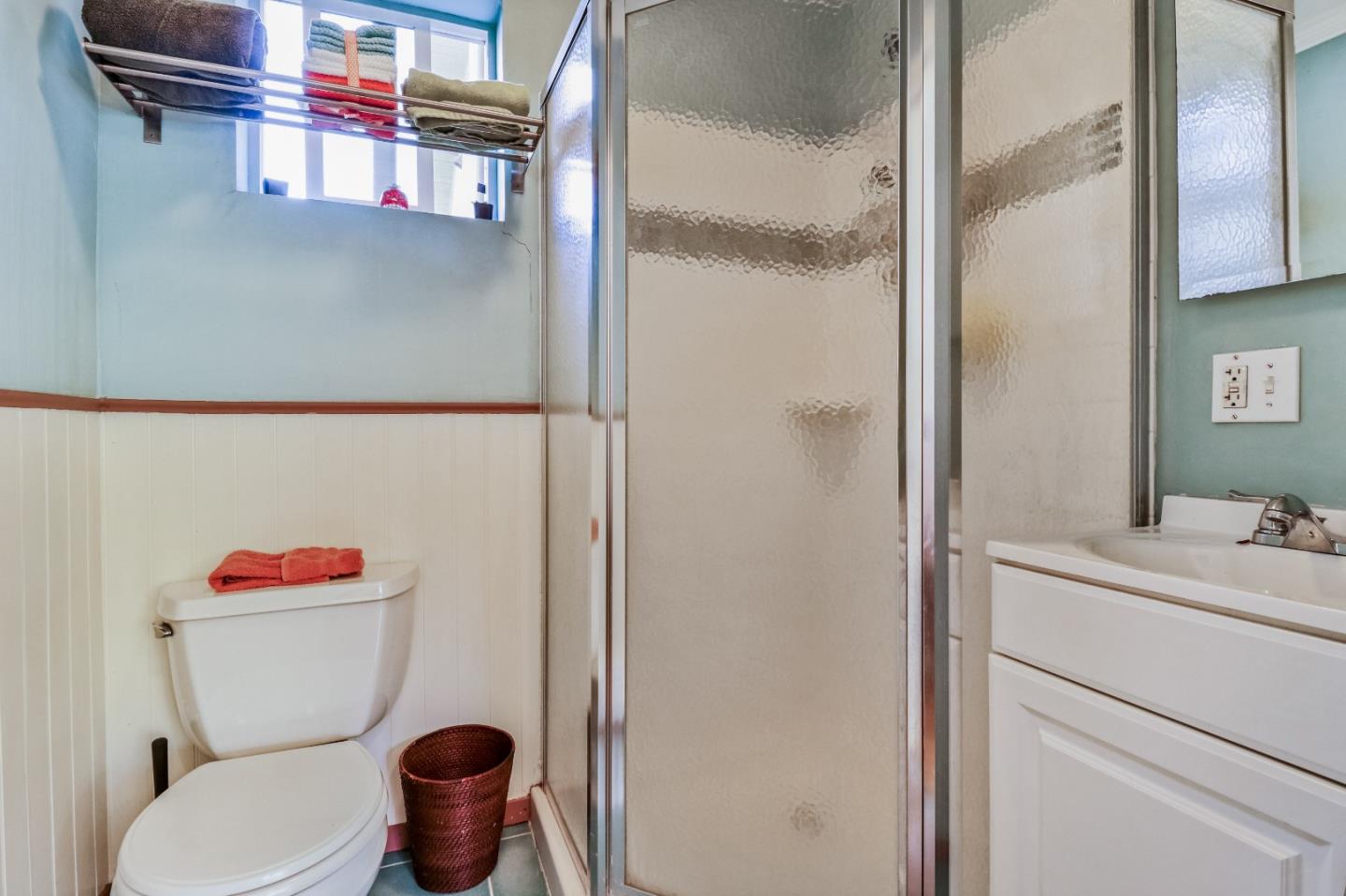 1401 Channing Way Berkeley, CA 94702 - Photo 34 of 43 a bathroom with a toilet and a shower