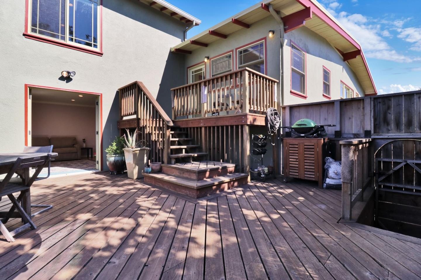 1401 Channing Way Berkeley, CA 94702 - Photo 37 of 43 a view of a house with barbeque and wooden floor