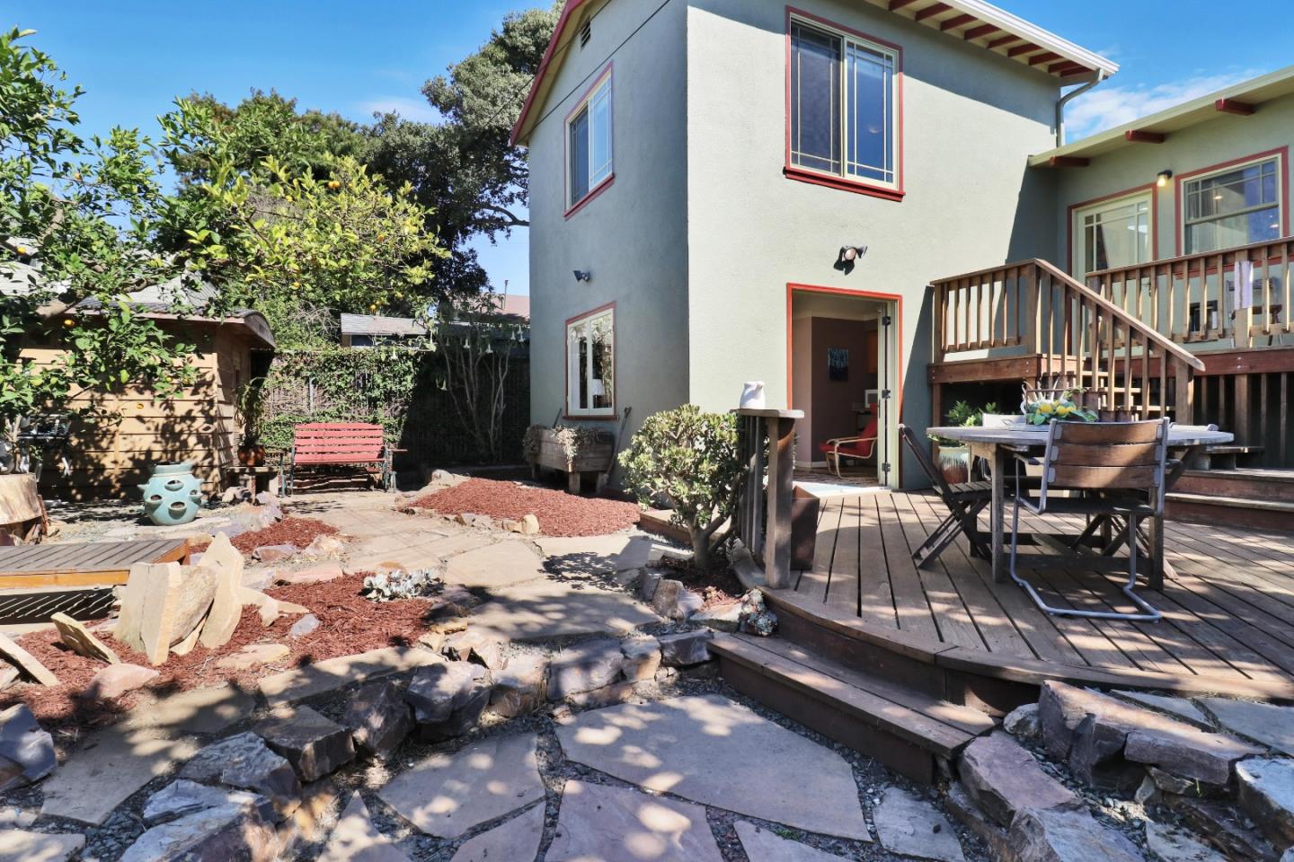 1401 Channing Way Berkeley, CA 94702 - Photo 39 of 43 a view of a patio with couches table and chairs and potted plants