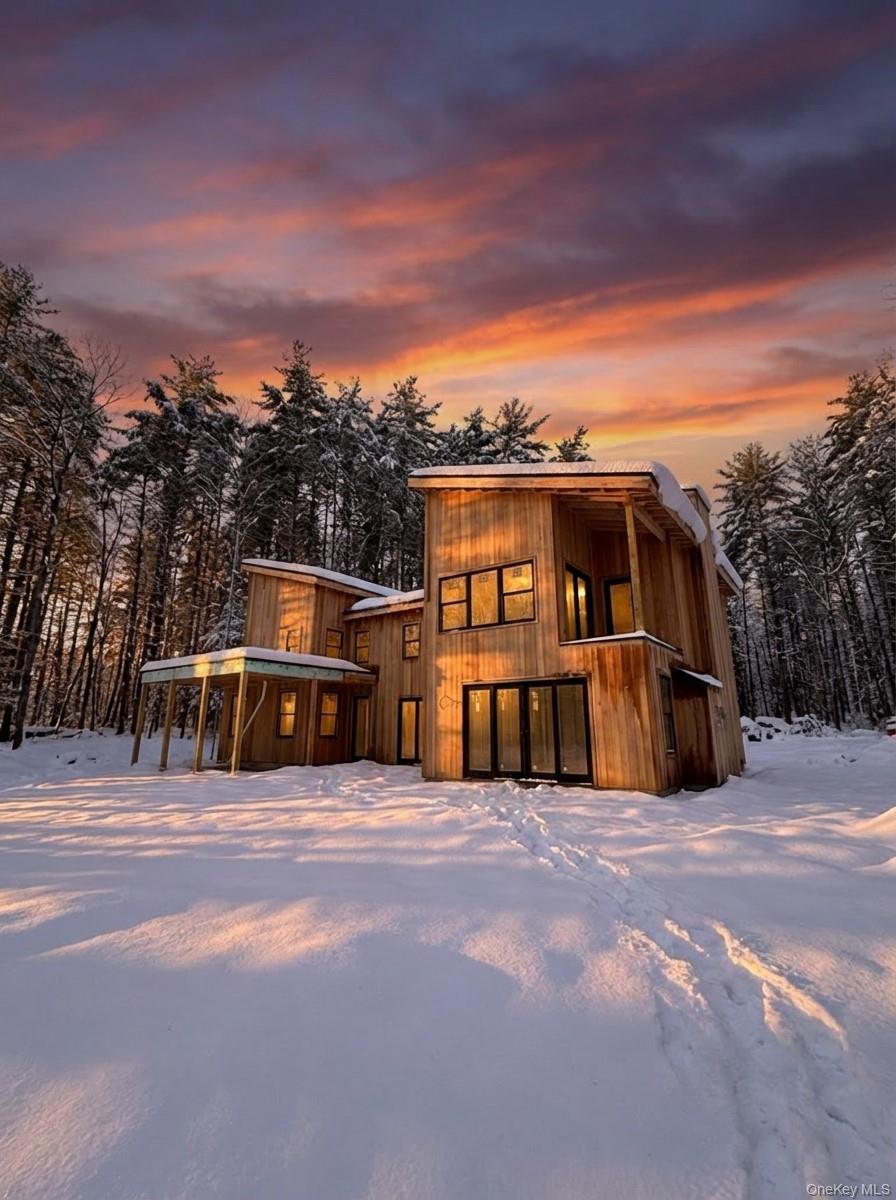 Taylor Road Fallsburg, NY 12733 - Photo 2 of 4 a view of a house with a big yard and large trees