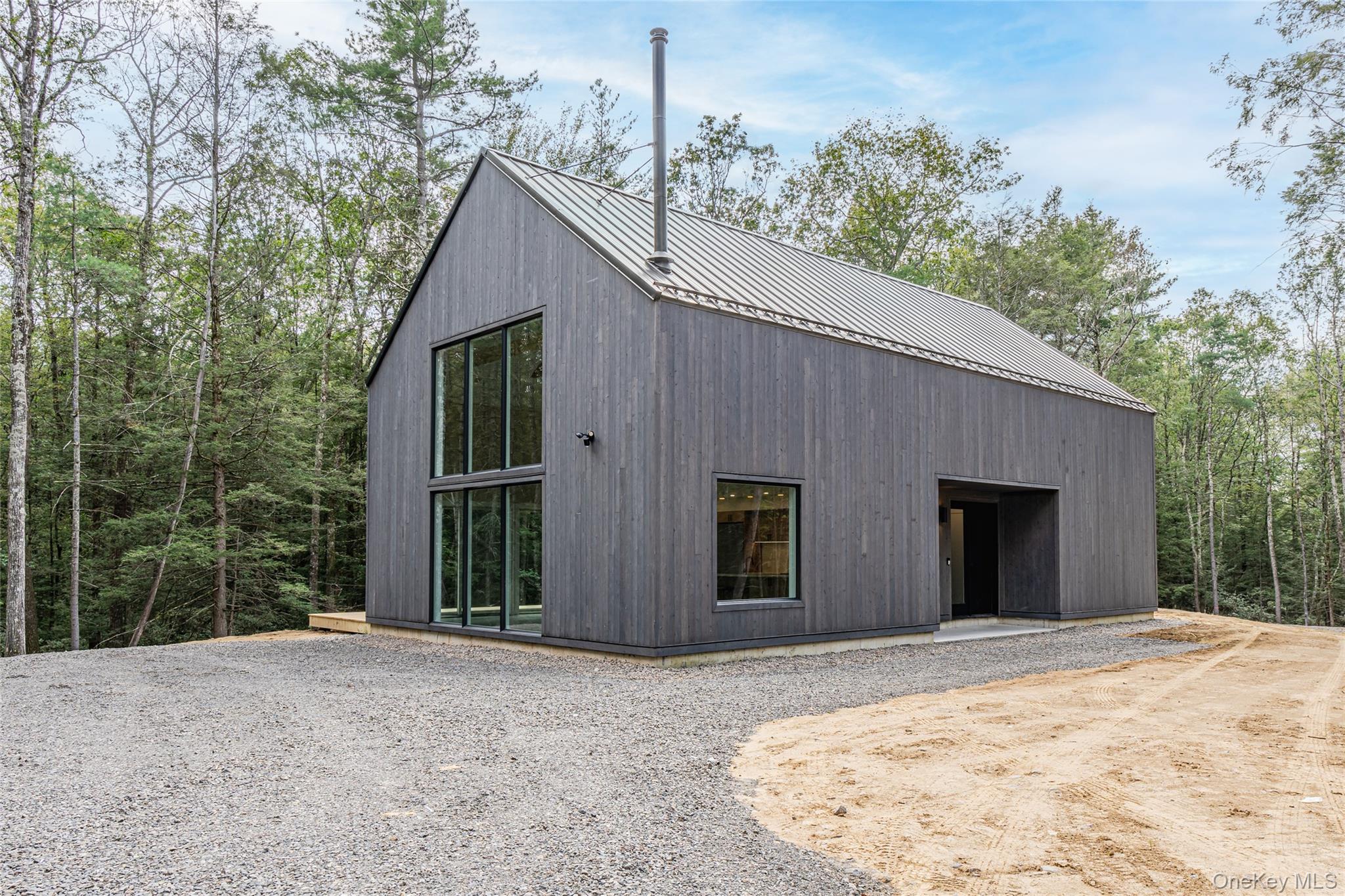 Taylor Road Fallsburg, NY 12733 - Photo 3 of 4 a view of a house with a backyard and balcony