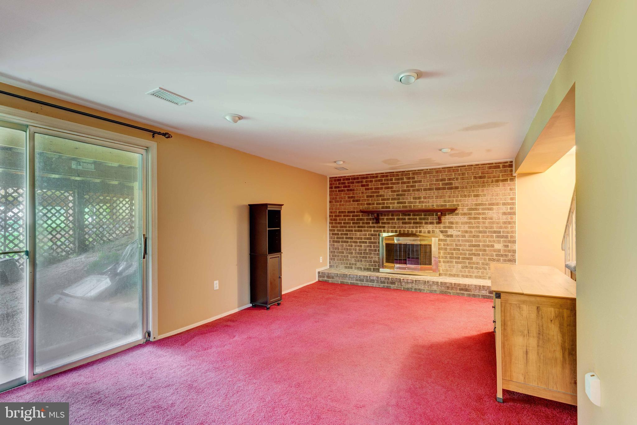 5698 Linton Road Sykesville, MD 21784 - Photo 26 of 42 Lower Level Rec Room w/wood burning FP, walkout