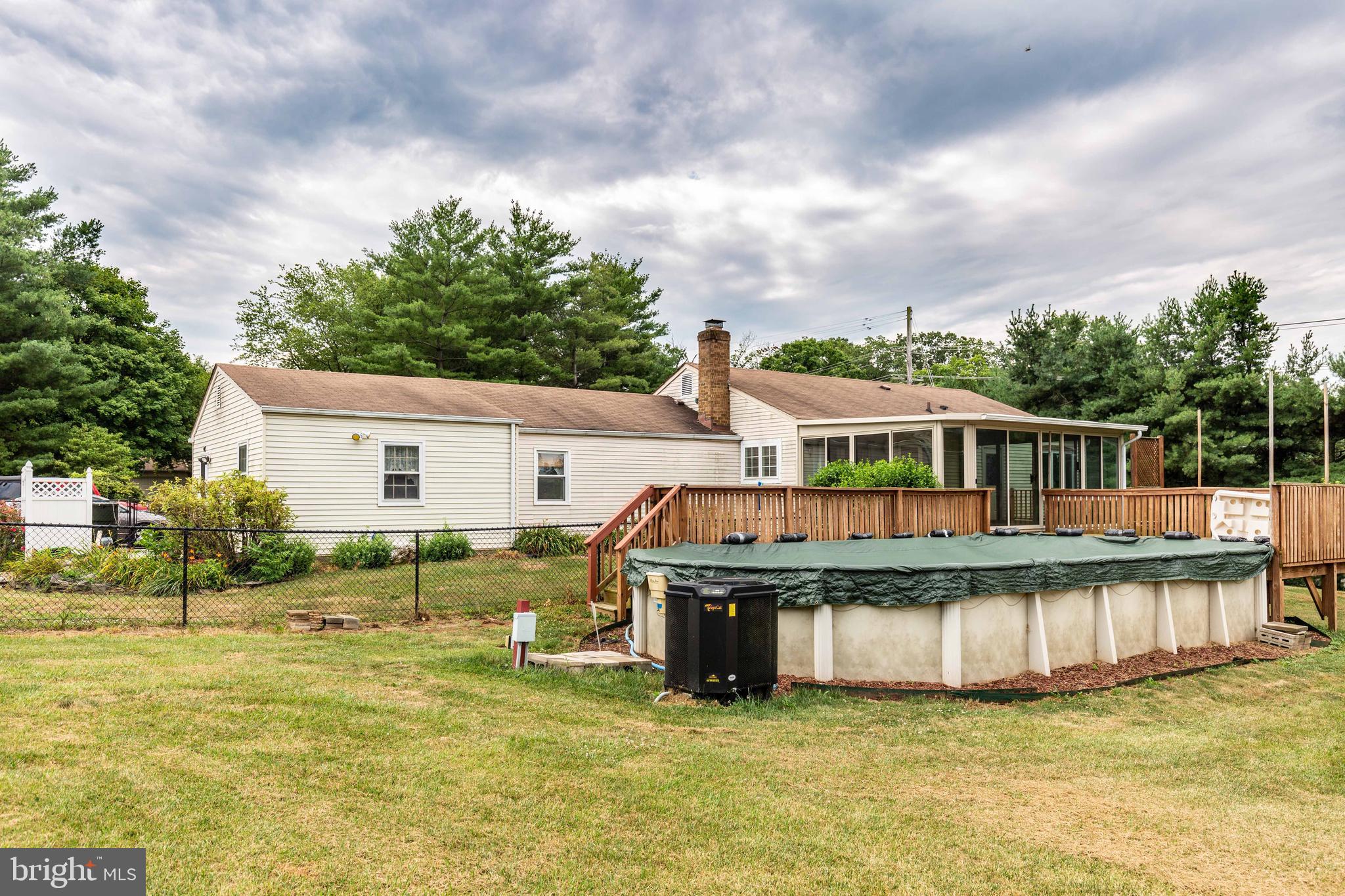 5698 Linton Road Sykesville, MD 21784 - Photo 35 of 42 Deck surrounds the 16 x 32 foot above ground pool