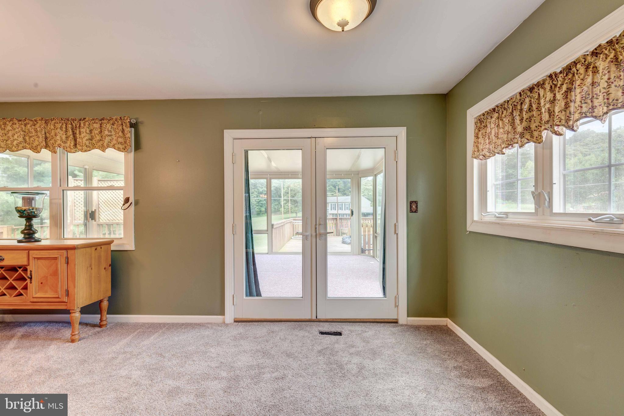 5698 Linton Road Sykesville, MD 21784 - Photo 9 of 42 Room off Kitchen to atrium door to Sun Room