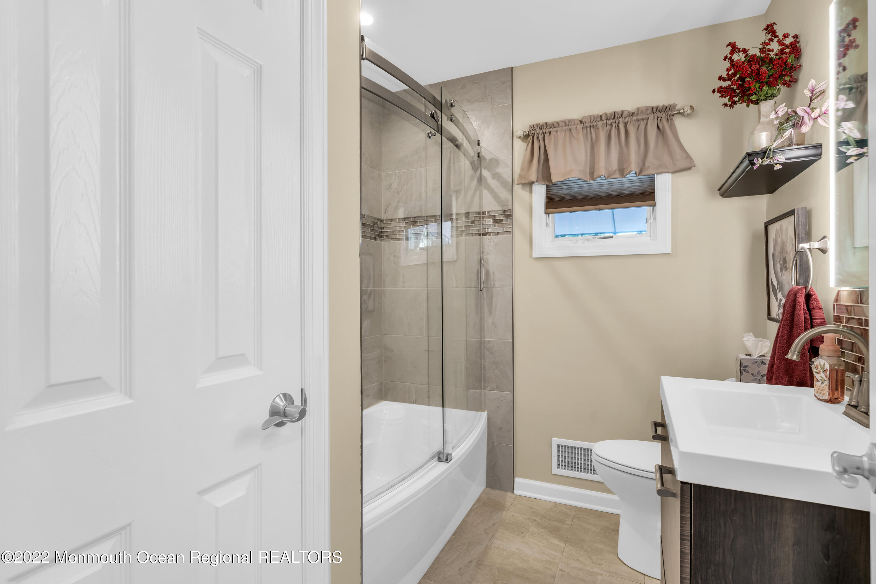 19 Lark Lane Brick, NJ 08724 - Photo 11 of 72 a bathroom with a sink a toilet and shower