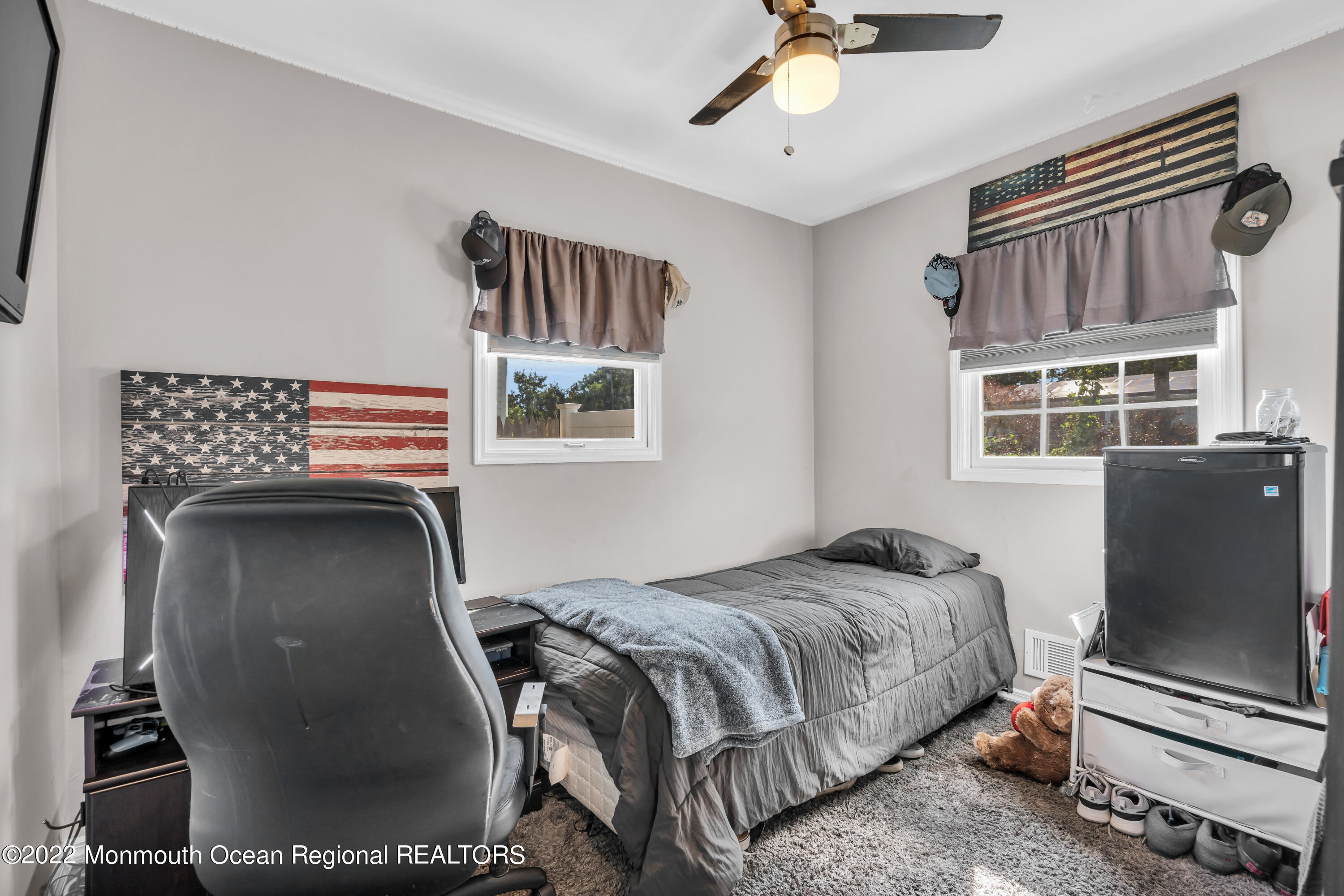 19 Lark Lane Brick, NJ 08724 - Photo 19 of 72 a bedroom with a bed and a flat tv screen on dresser