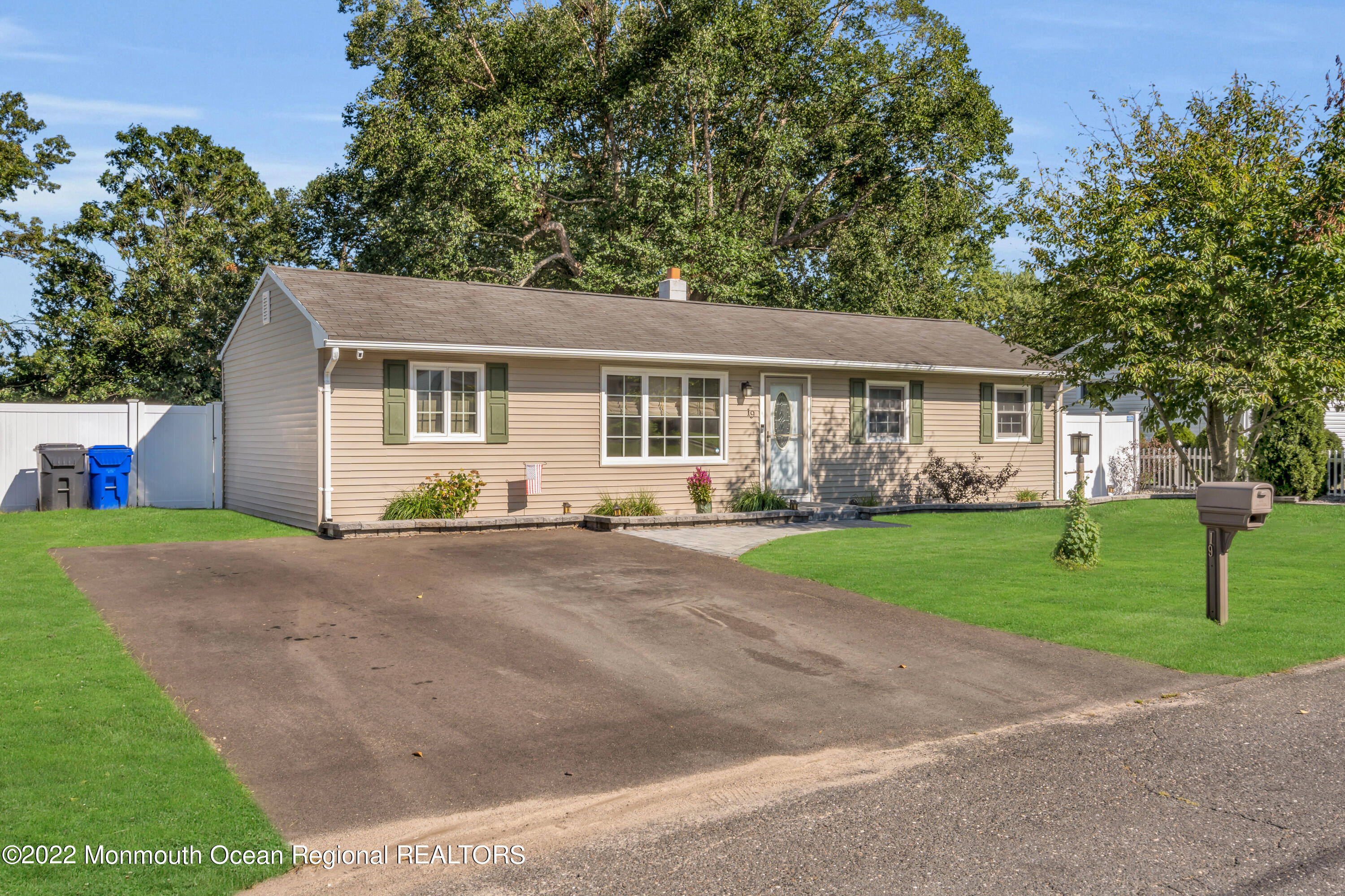 19 Lark Lane Brick, NJ 08724 - Photo 2 of 72 a front view of house with yard and green space