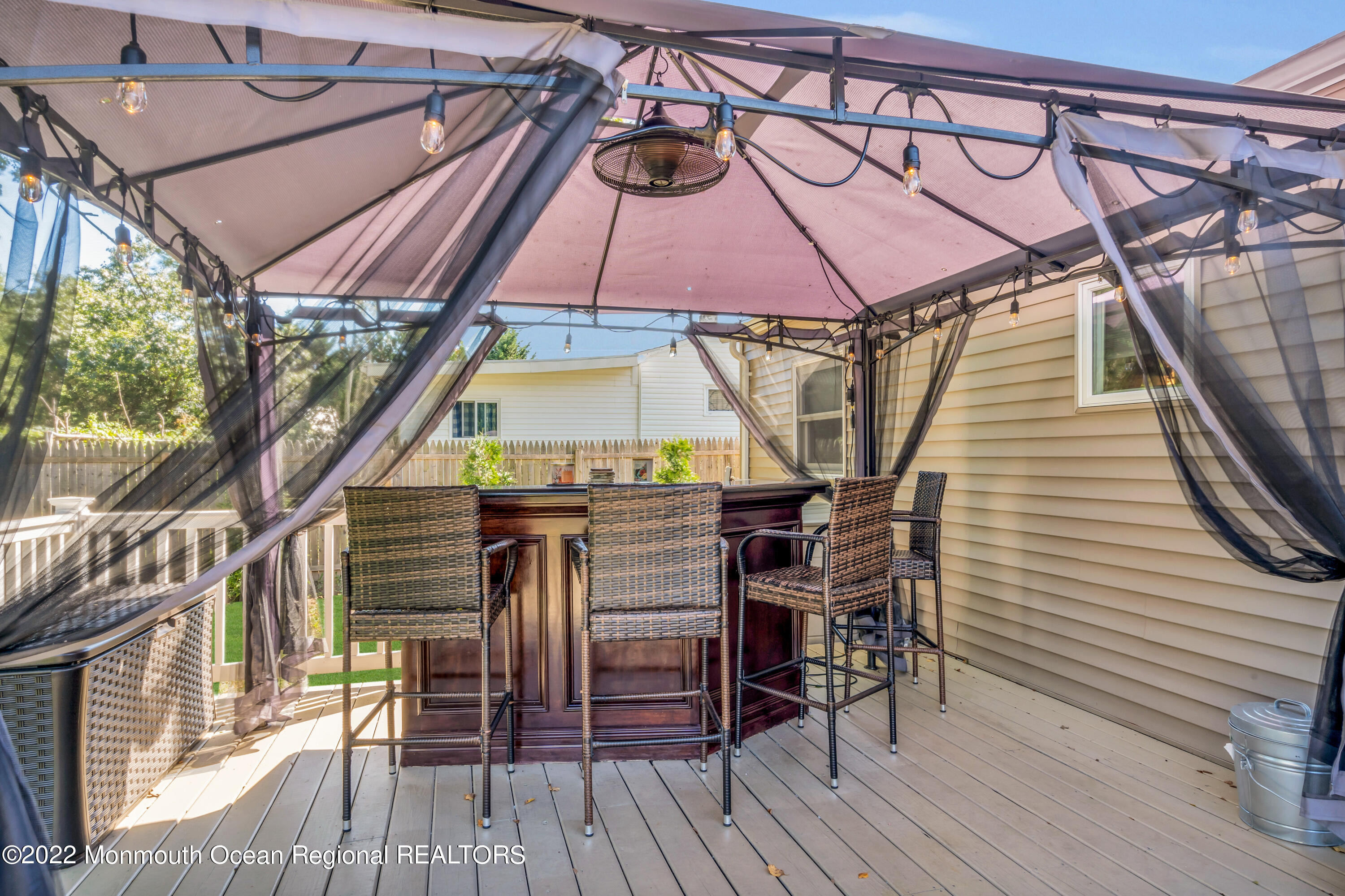 19 Lark Lane Brick, NJ 08724 - Photo 24 of 72 a view of a chairs and table on the deck
