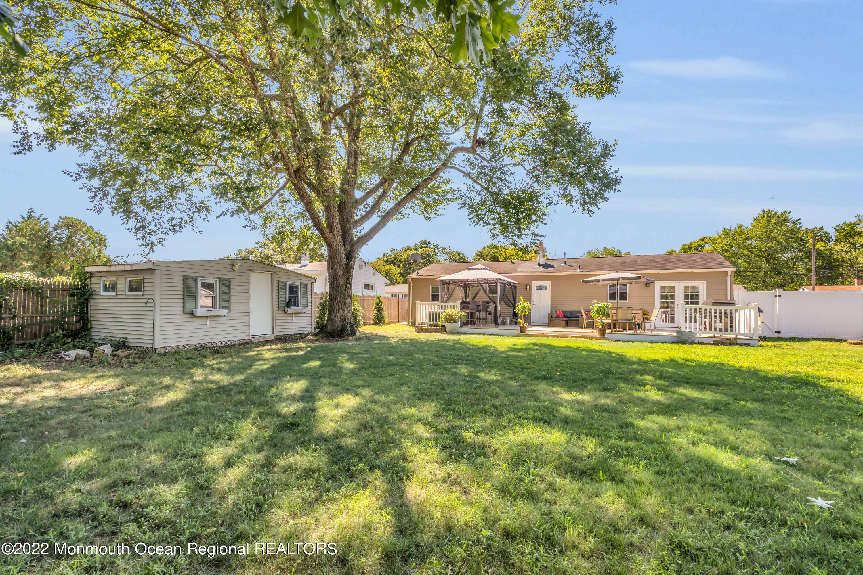 19 Lark Lane Brick, NJ 08724 - Photo 28 of 72 a front view of a house with a garden