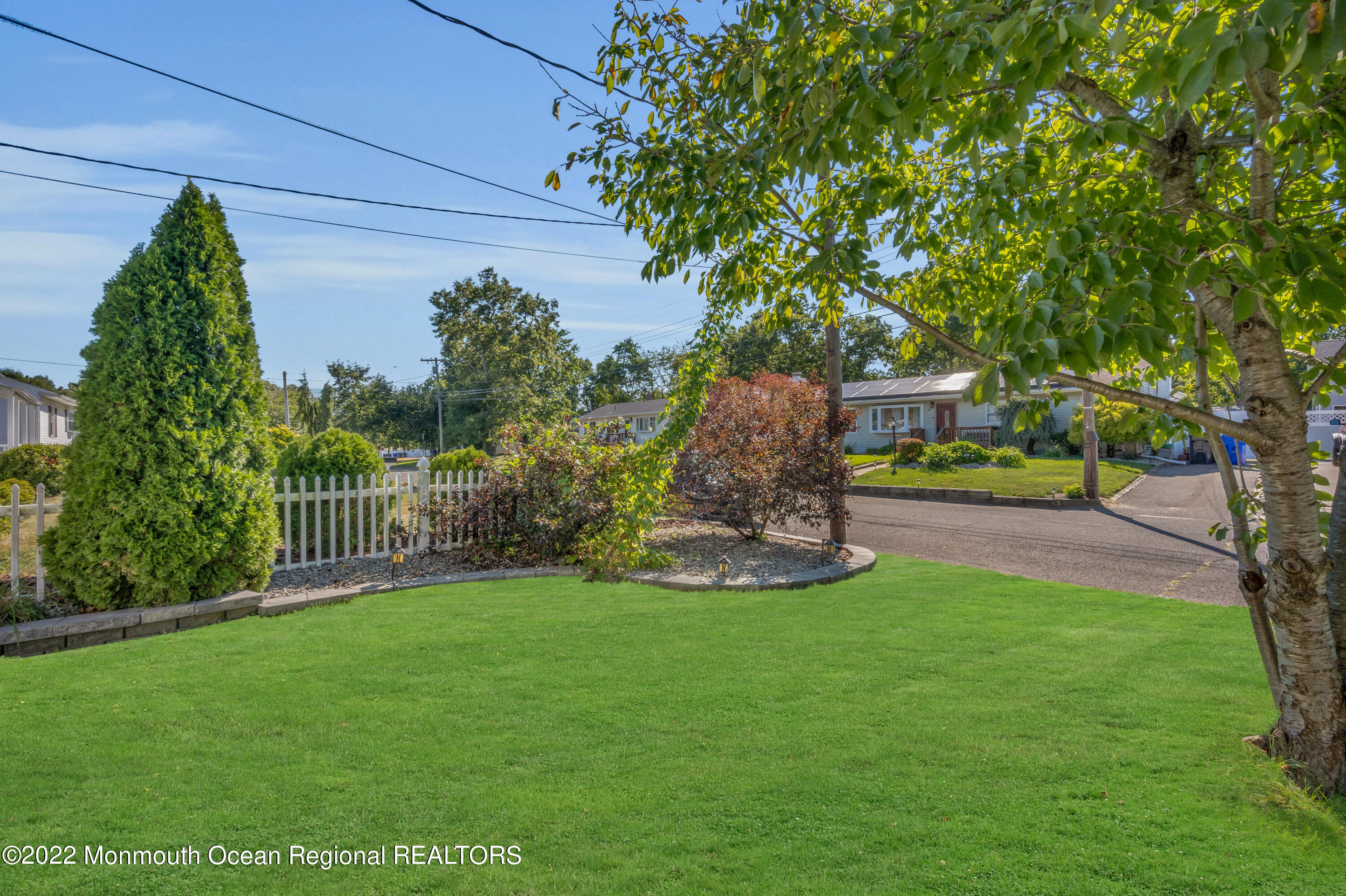 19 Lark Lane Brick, NJ 08724 - Photo 29 of 72 a garden view with a fountain