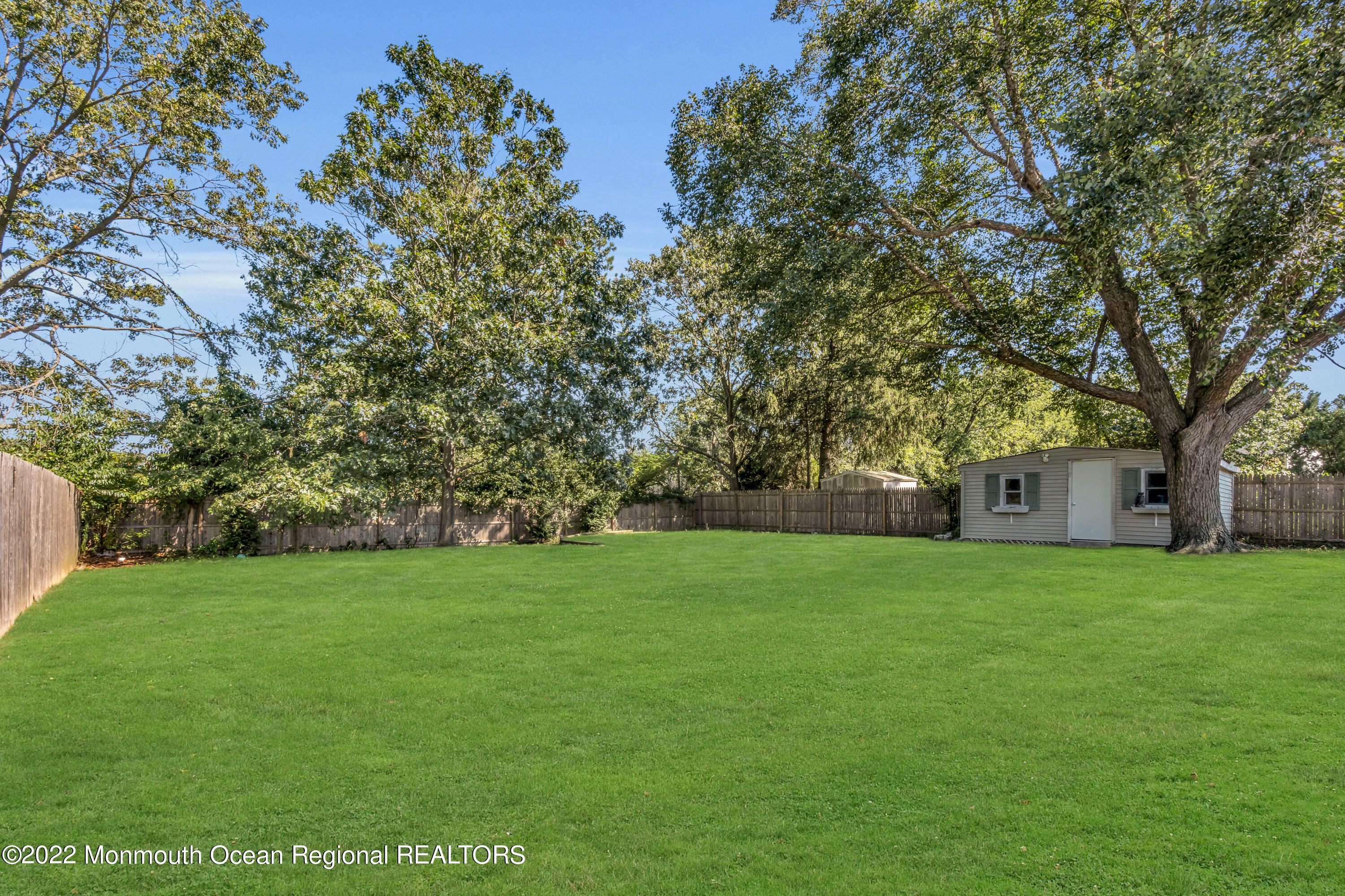 19 Lark Lane Brick, NJ 08724 - Photo 50 of 72 a house with a tree in front of it