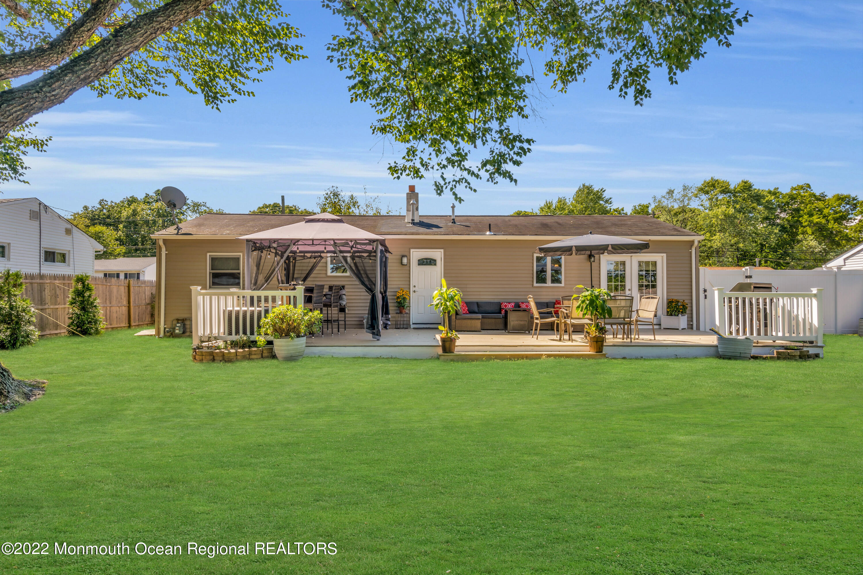 19 Lark Lane Brick, NJ 08724 - Photo 52 of 72 a view of a house with a yard porch and sitting area