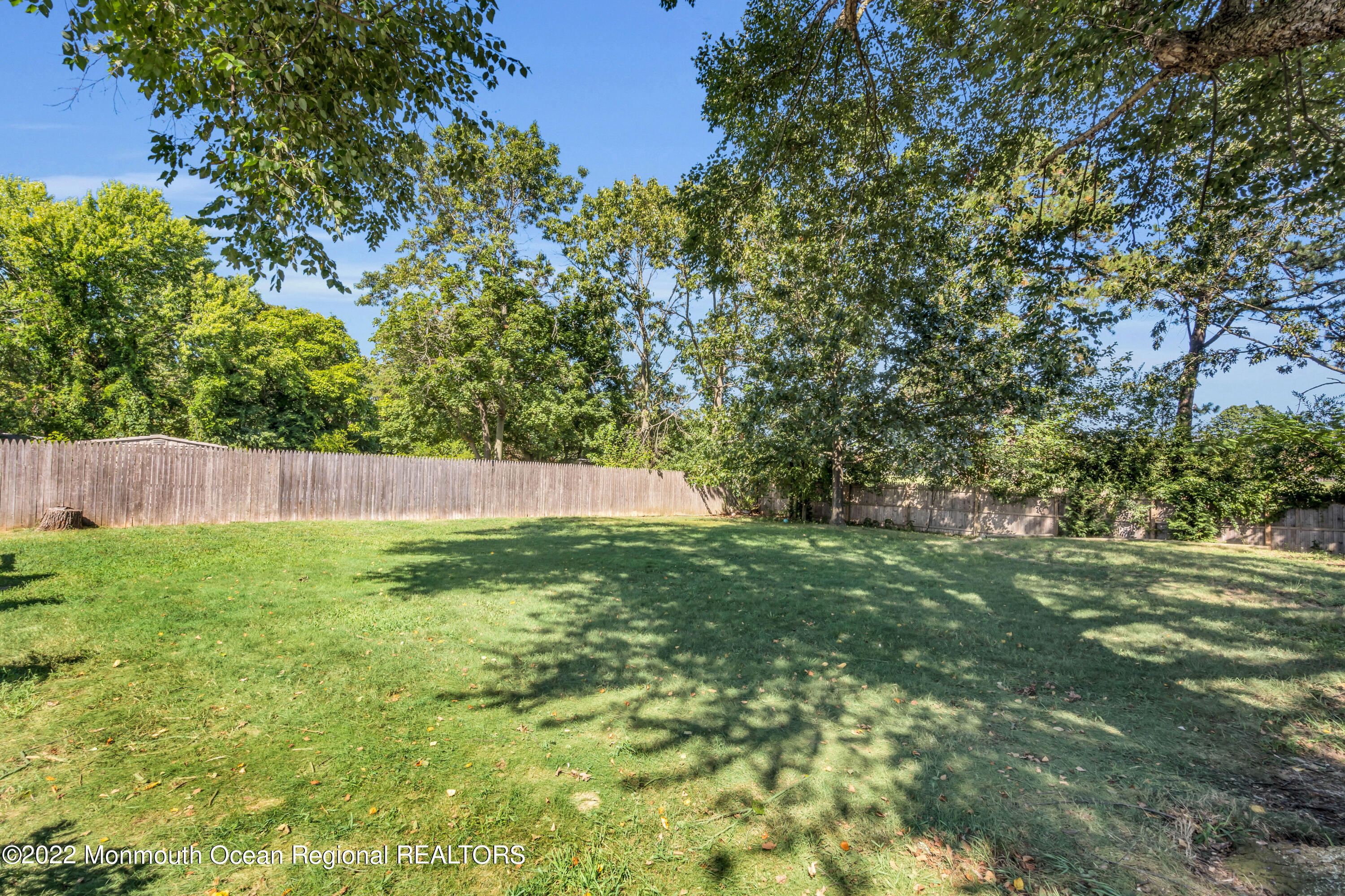 19 Lark Lane Brick, NJ 08724 - Photo 54 of 72 a view of a yard with a tree