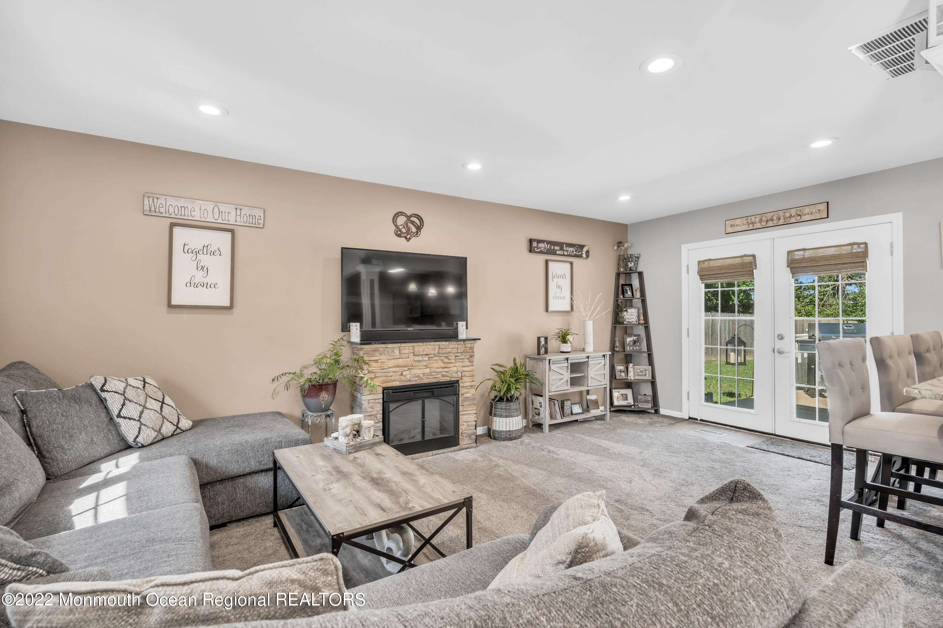 19 Lark Lane Brick, NJ 08724 - Photo 61 of 72 a living room with furniture and a fireplace