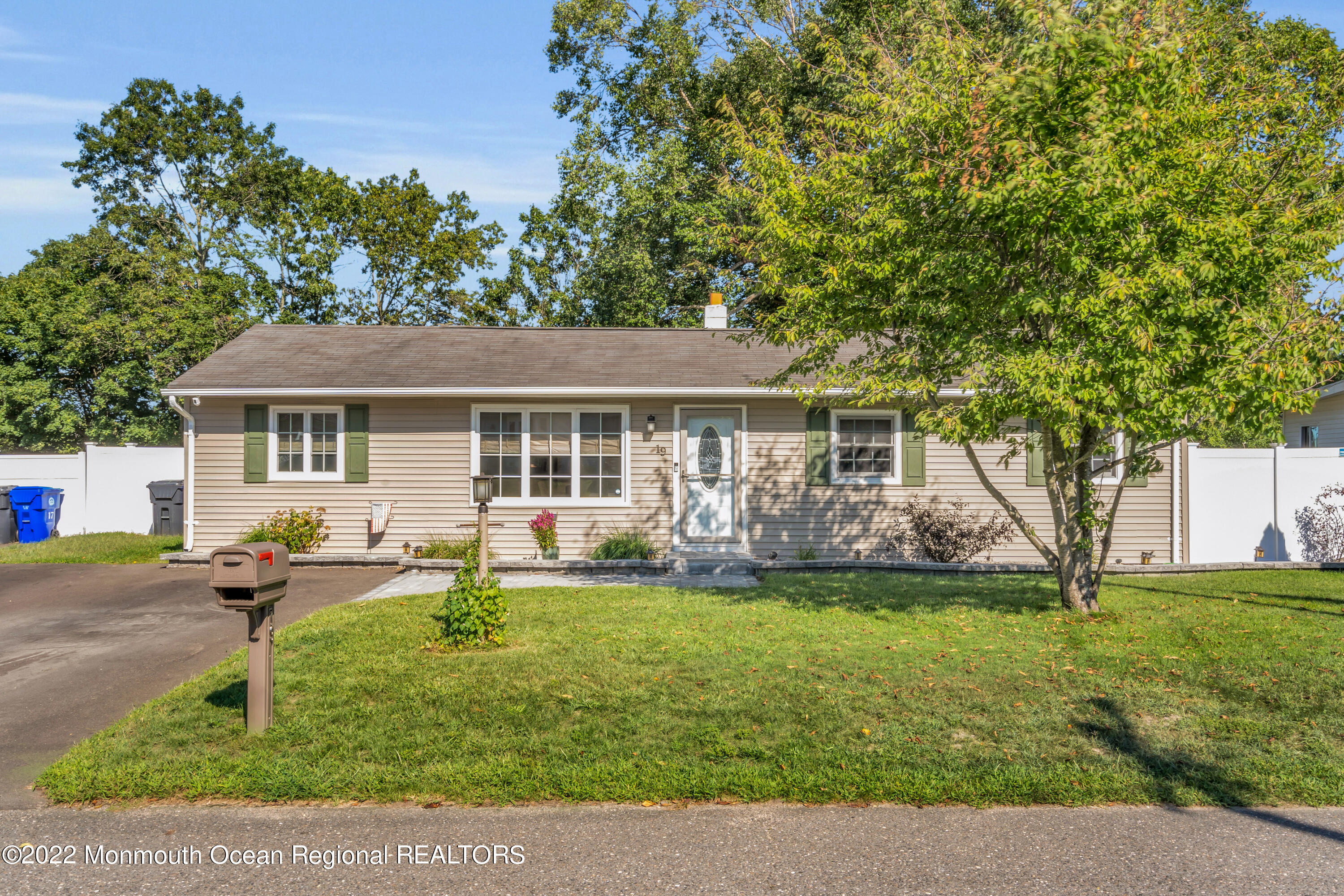 19 Lark Lane Brick, NJ 08724 - Photo 65 of 72 front view of a house with a yard