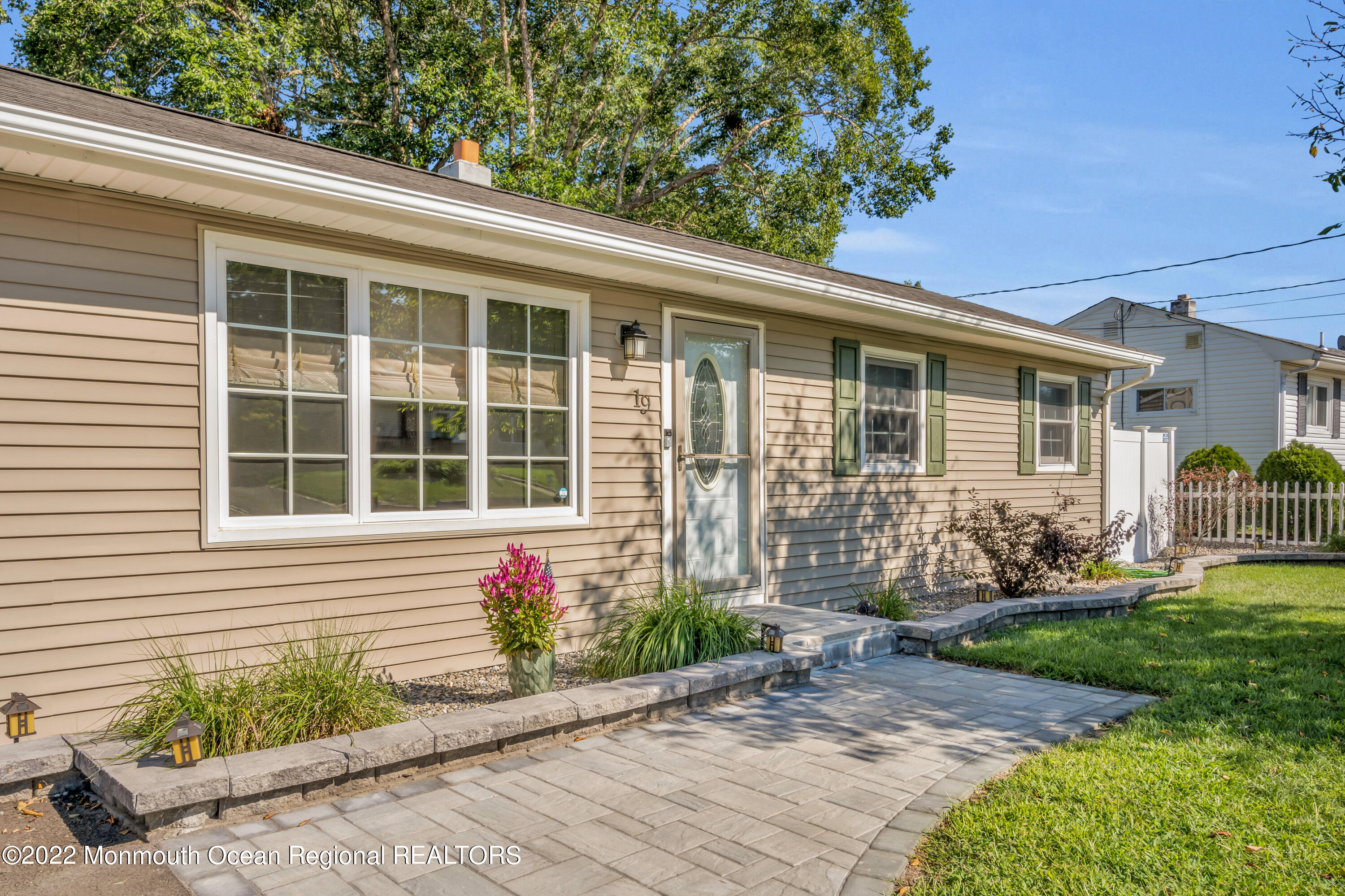 19 Lark Lane Brick, NJ 08724 - Photo 69 of 72 a front view of a house with garden