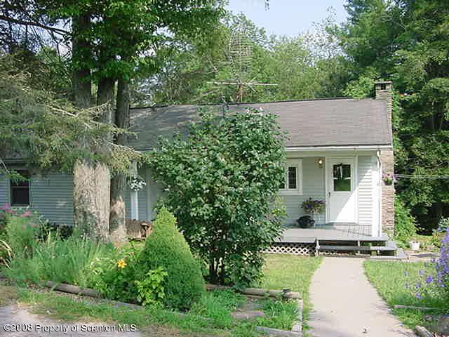 1 Rr Mehoopany, PA 18629 - Photo 2 of 4 a house view with a garden space