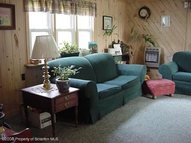 1 Rr Mehoopany, PA 18629 - Photo 3 of 4 a living room with furniture and a large window