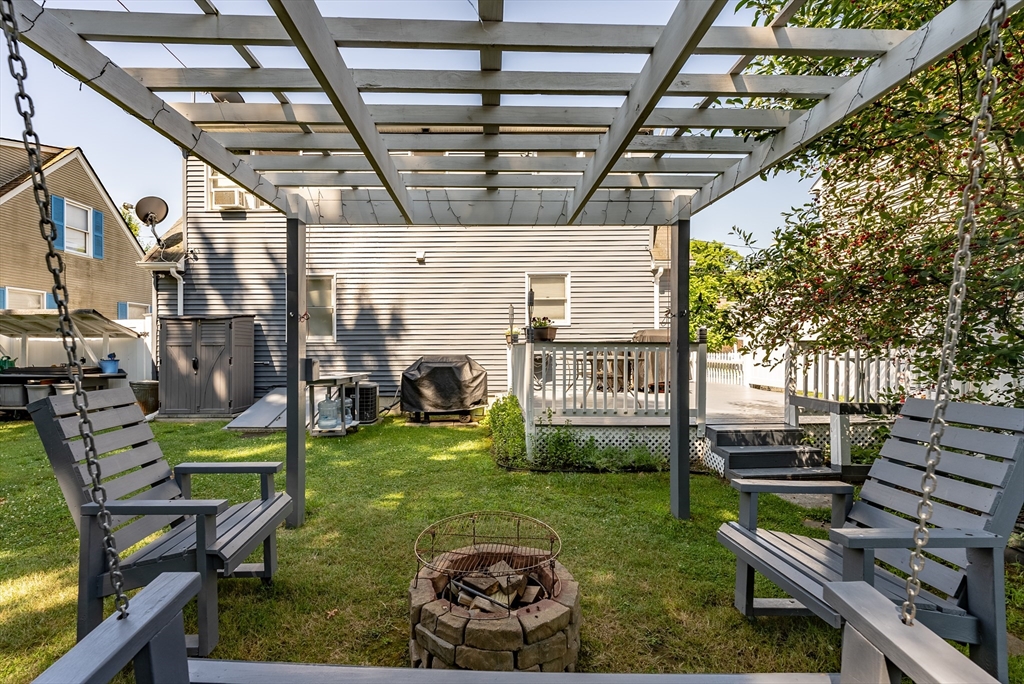 299 Morton Street Springfield, MA 01119 - Photo 3 of 37 a view of a chairs in backyard