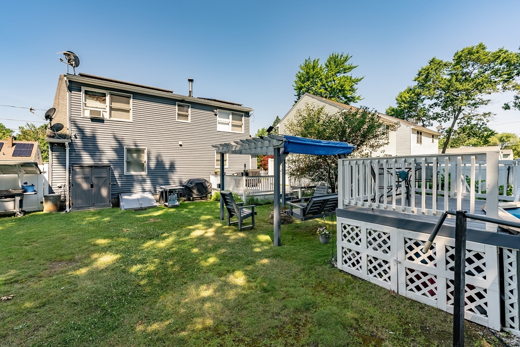 299 Morton Street Springfield, MA 01119 - Photo 4 of 37 a backyard of a house with table and chairs
