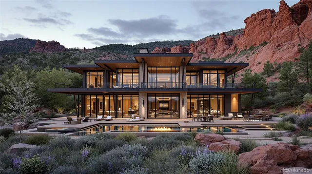a front view of a house with swimming pool and a yard