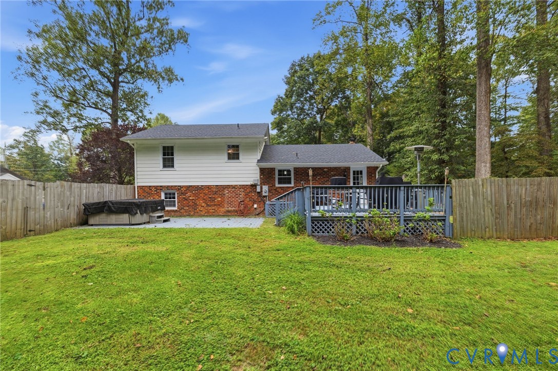 6723 Cherry Road Quinton, VA 23141 - Photo 25 of 28 Expansive backyard featuring a wood privacy fence,