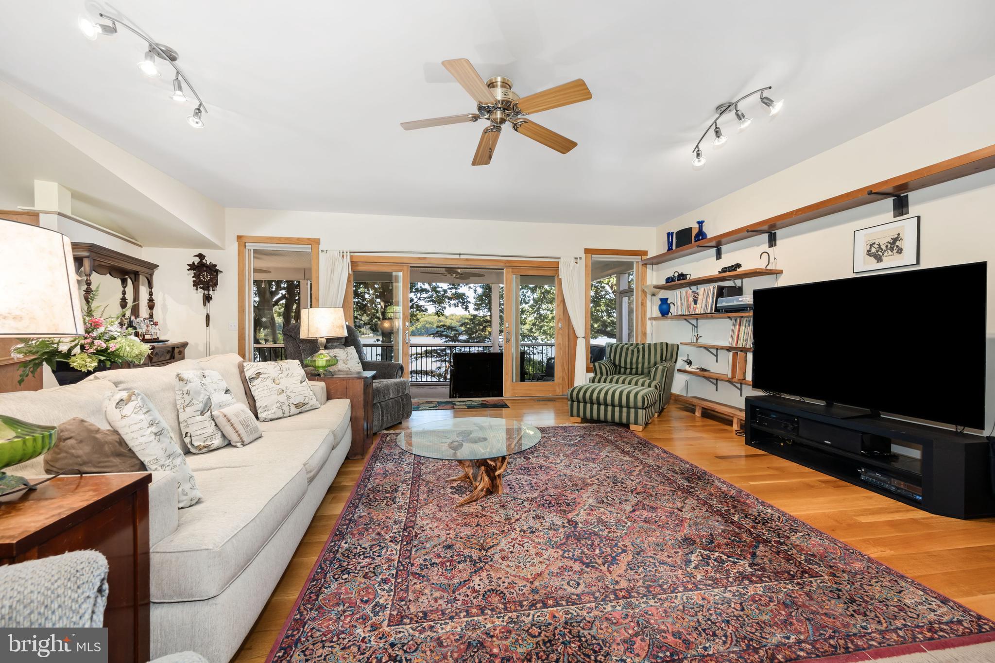 25209 Wymont Park Road Worton, MD 21678 - Photo 12 of 51 a living room with furniture and a flat screen tv
