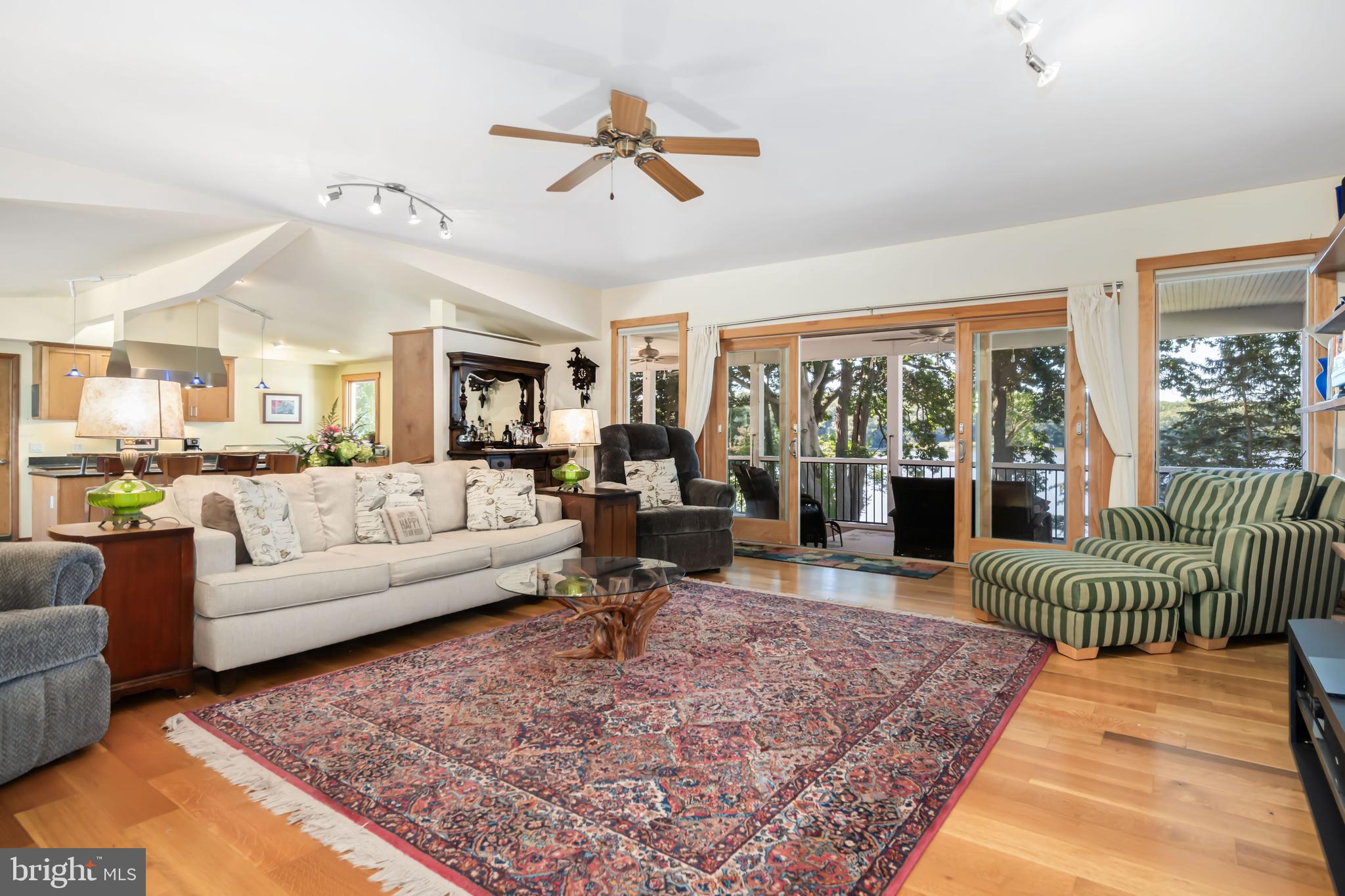 25209 Wymont Park Road Worton, MD 21678 - Photo 13 of 51 a living room with furniture or wooden floor and a large window