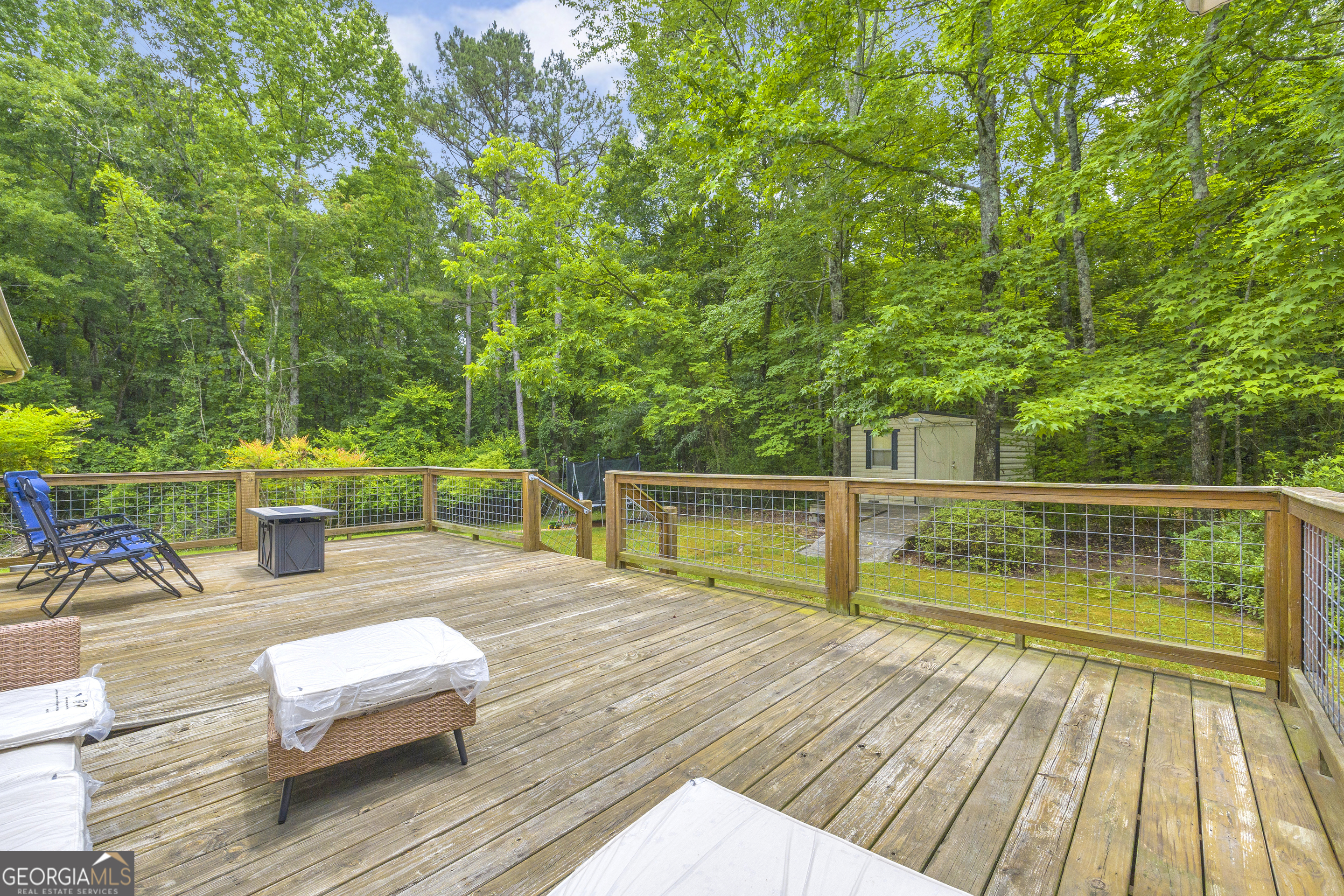 163 Tuxedo Drive Commerce, GA 30530 - Photo 47 of 62 a view of deck with chairs and wooden floor