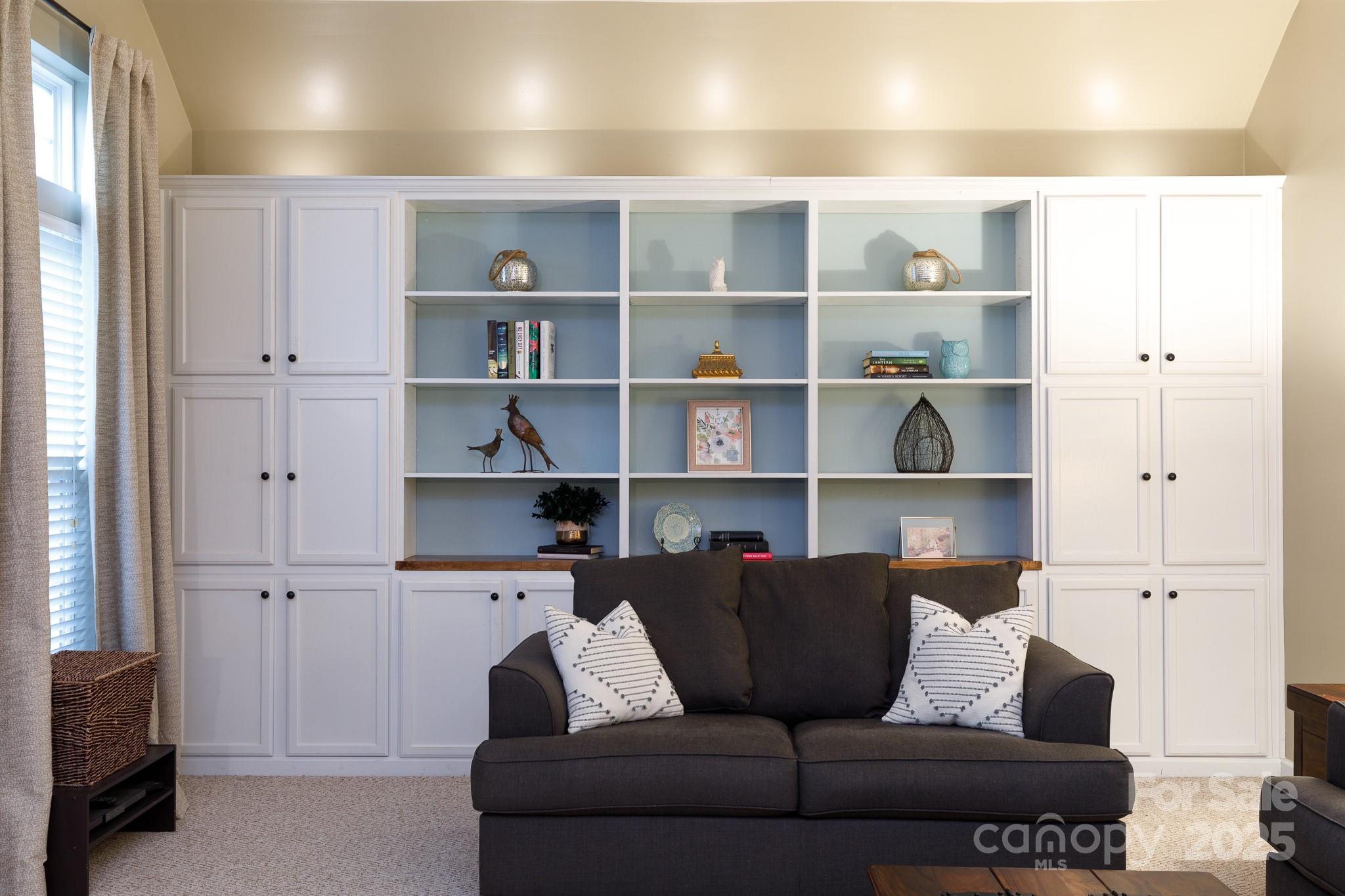 708 Drew Avenue Fort Mill, SC 29708 - Photo 12 of 30 a living room with furniture and a shelf