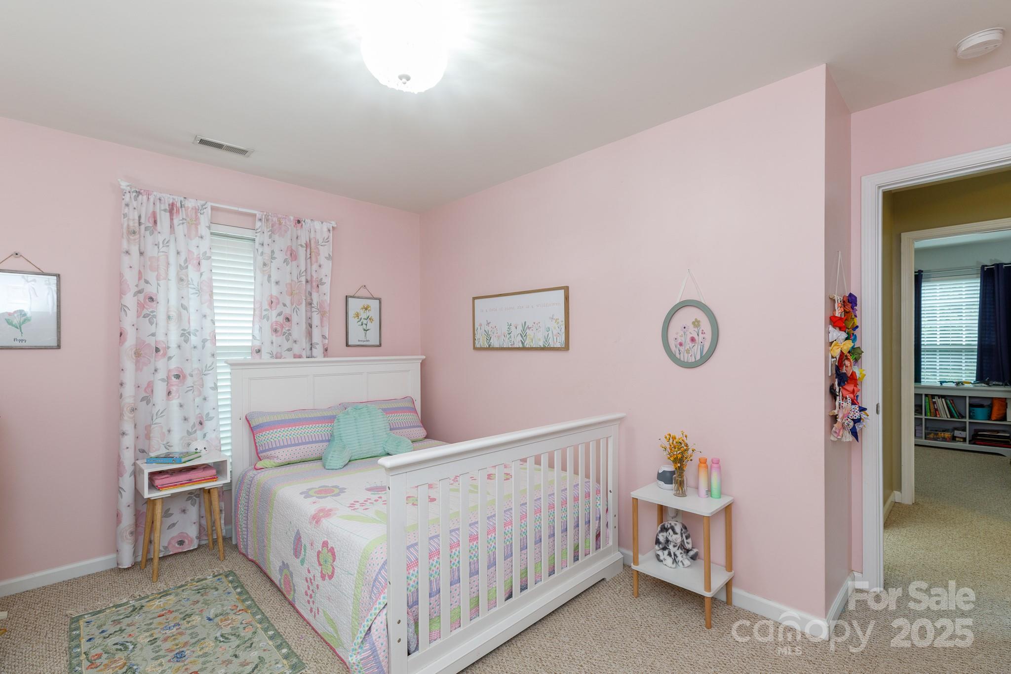 708 Drew Avenue Fort Mill, SC 29708 - Photo 17 of 30 a bedroom with a bed and a table