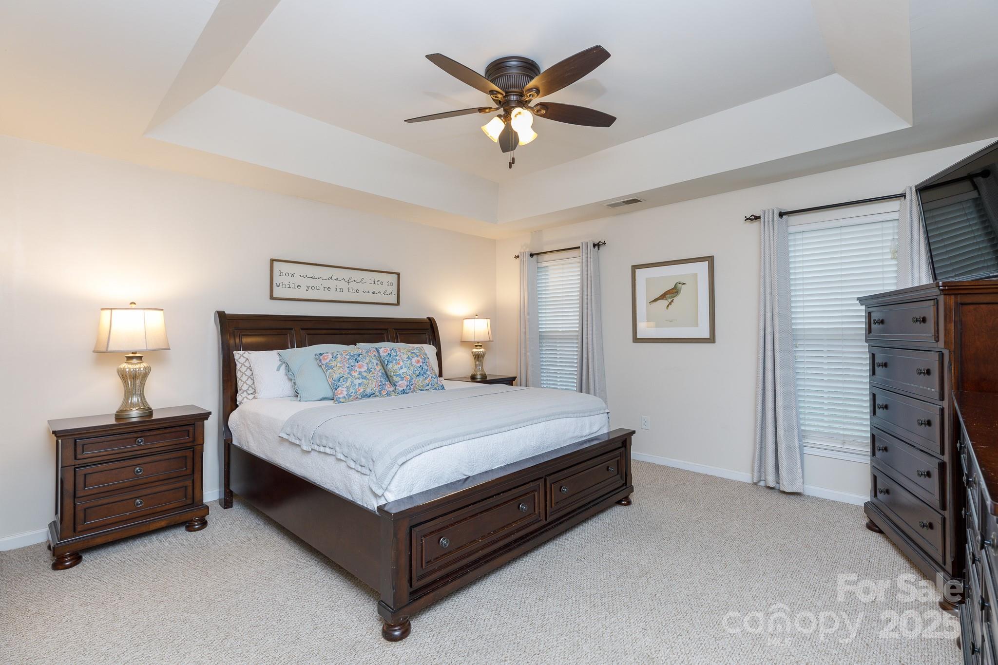708 Drew Avenue Fort Mill, SC 29708 - Photo 25 of 30 a bedroom with a bed and a ceiling fan
