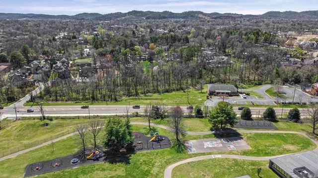 an aerial view of a house with a garden