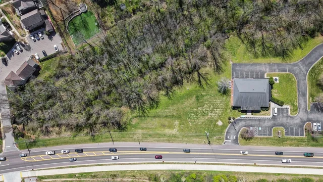 an aerial view of a yard with green space