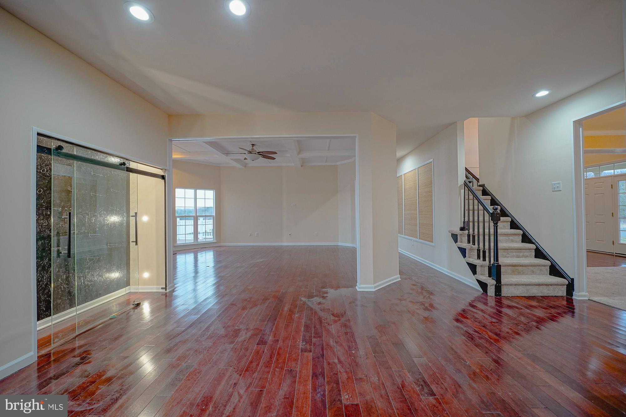 67 Mullen Drive Sicklerville, NJ 08081 - Photo 28 of 57 a view of a hallway with wooden floor and staircase
