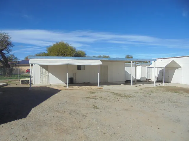 a view of empty room with a garage