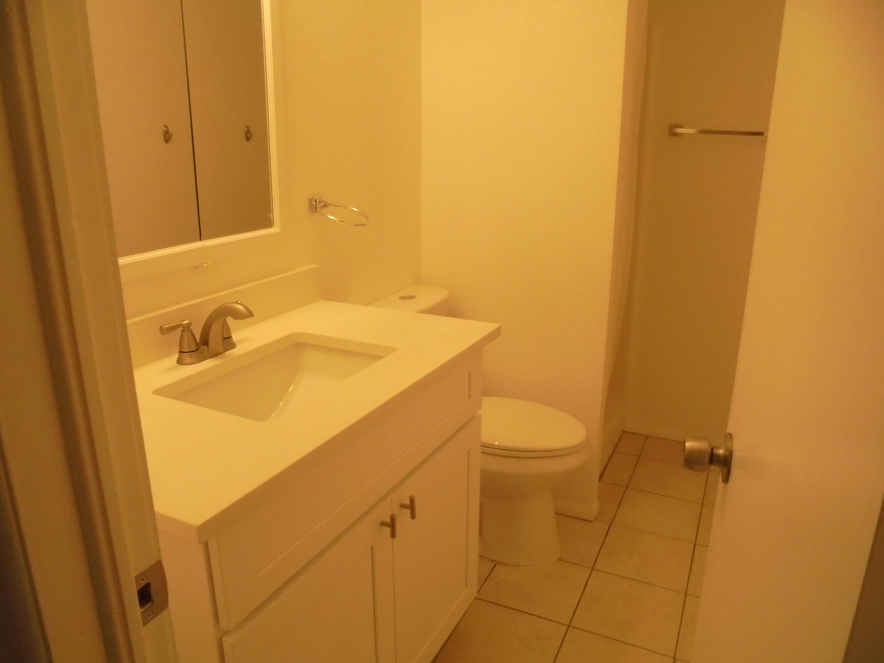 2274 Riviera Drive Blythe, CA 92225 - Photo 8 of 22 a bathroom with a sink a toilet and shower