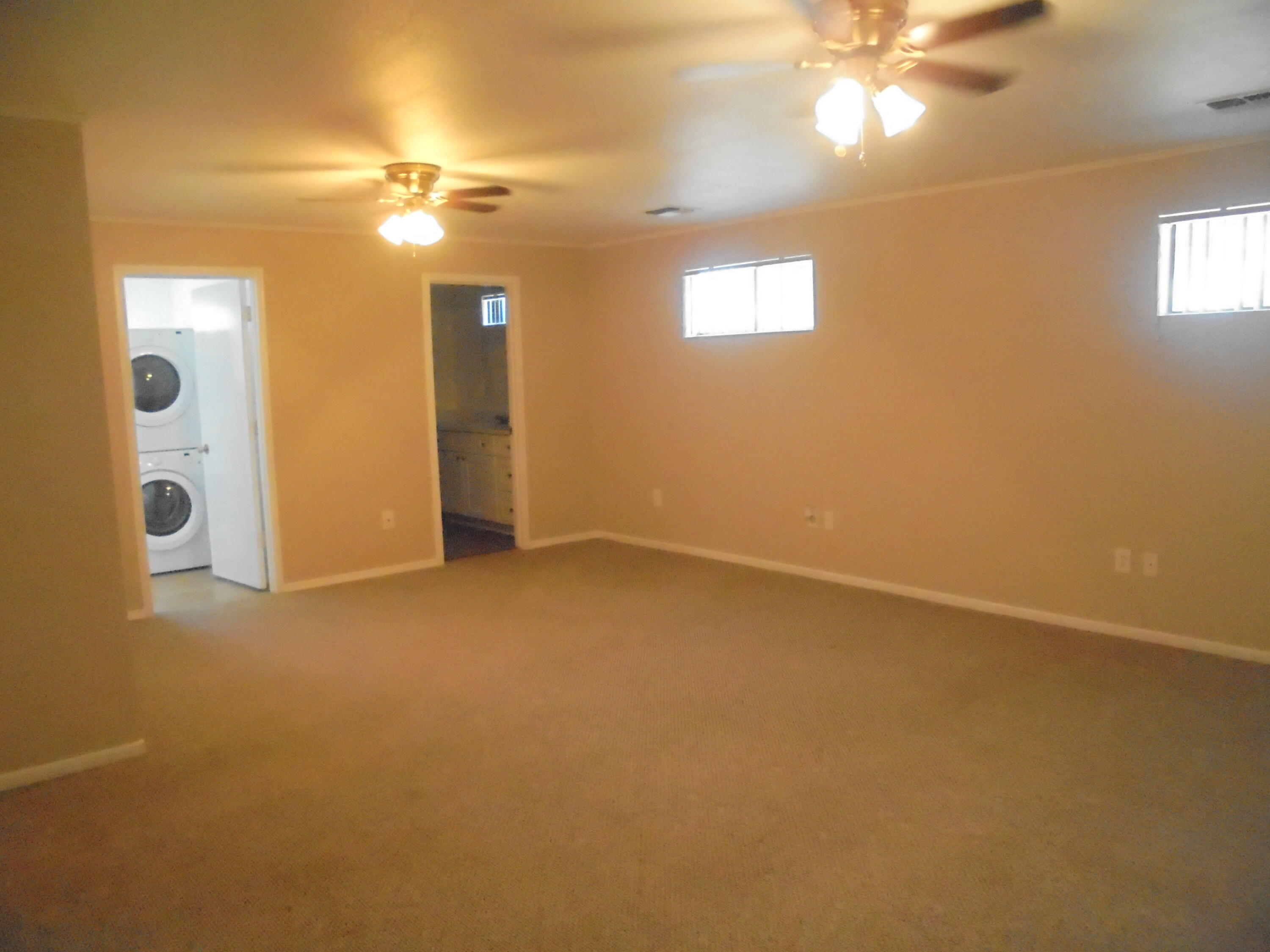 2274 Riviera Drive Blythe, CA 92225 - Photo 10 of 22 a view of an empty room with a chandelier fan