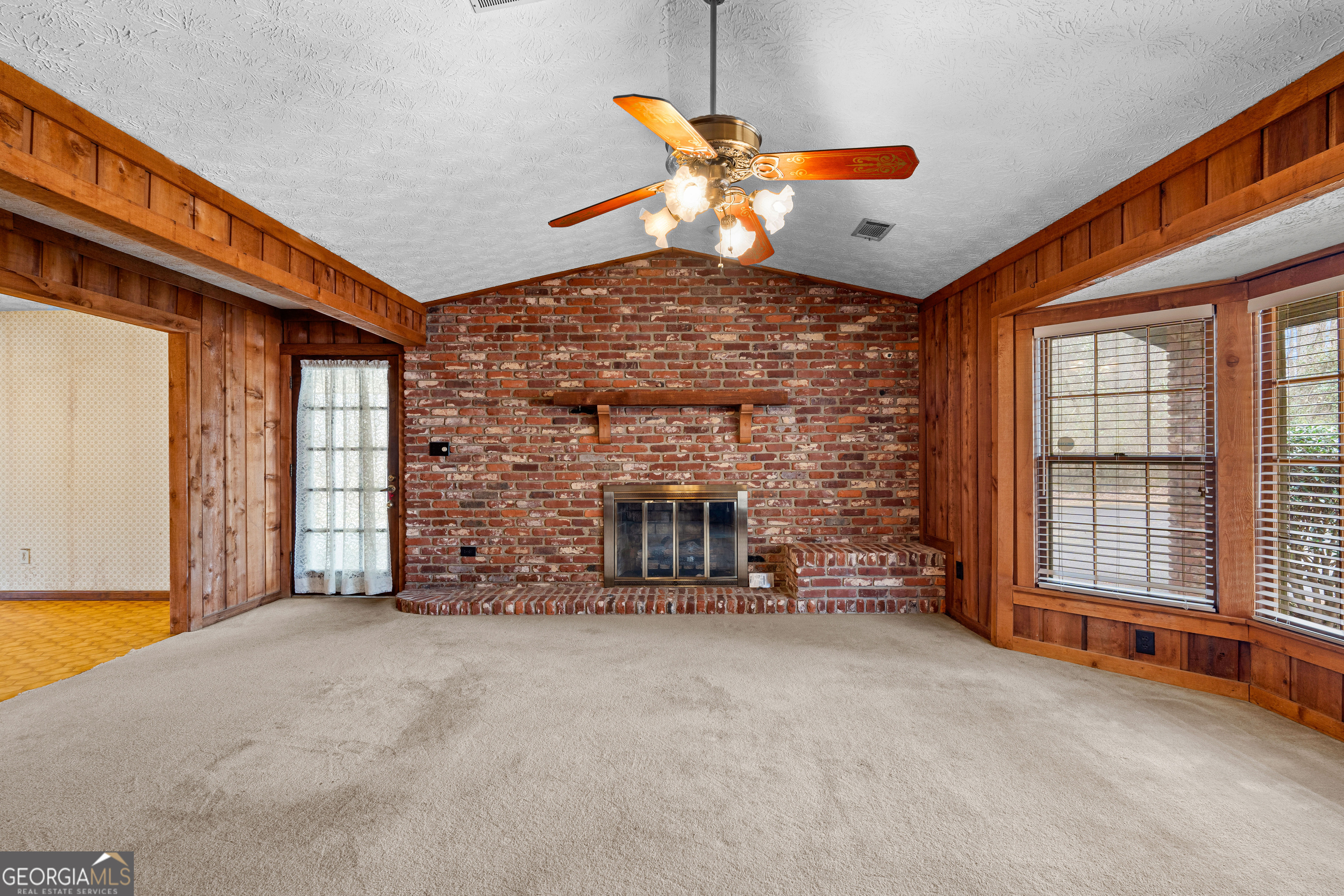 447 Adams Road Fayetteville, GA 30214 - Photo 11 of 52 an empty room with windows