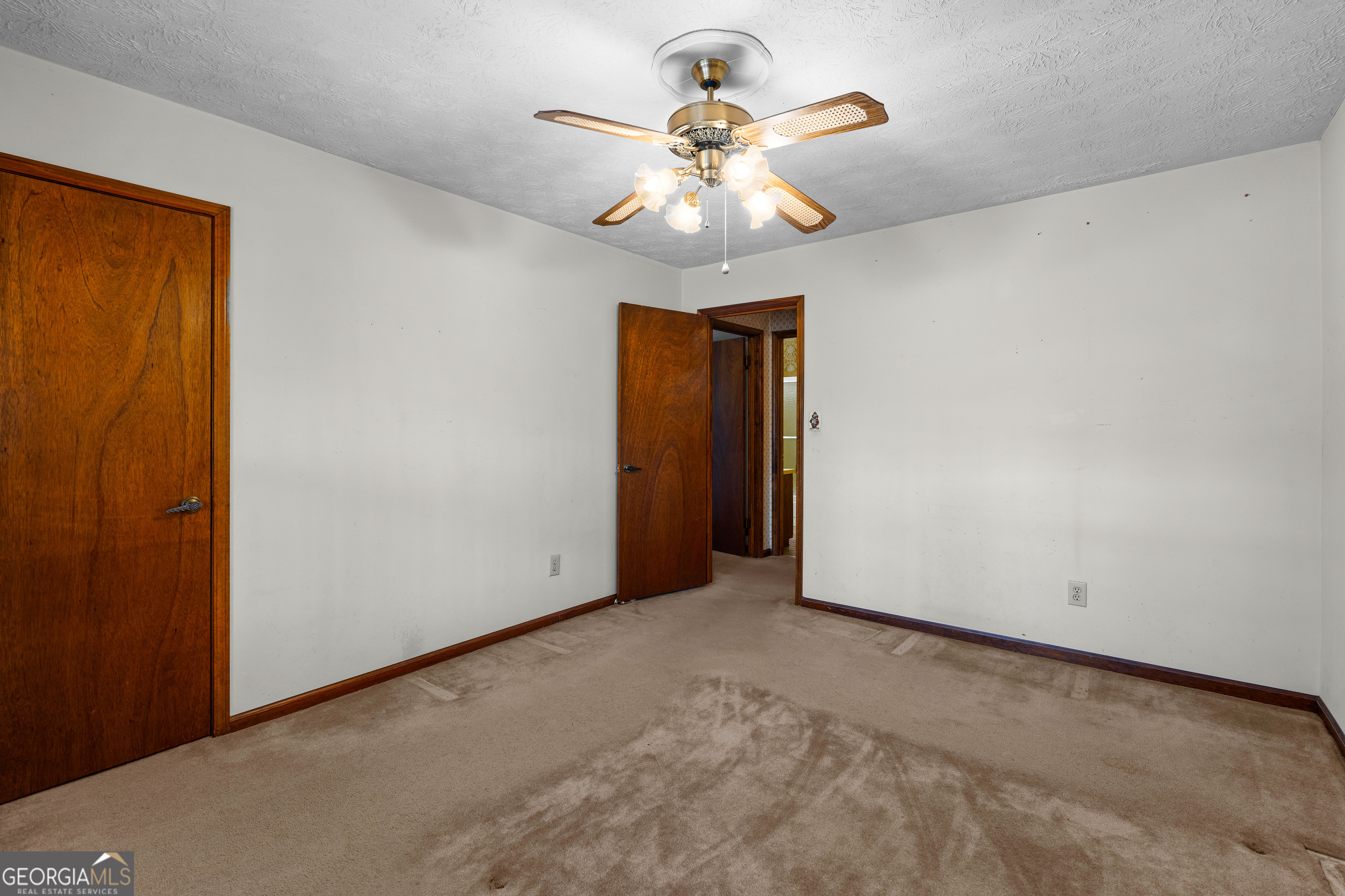 447 Adams Road Fayetteville, GA 30214 - Photo 26 of 52 a view of an empty room with a window