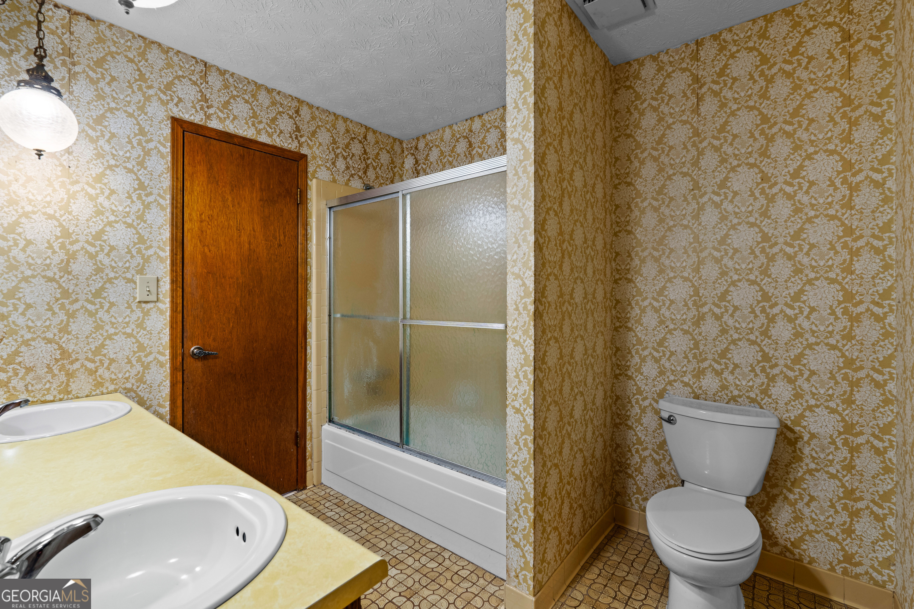 447 Adams Road Fayetteville, GA 30214 - Photo 27 of 52 a bathroom with a sink and a mirror